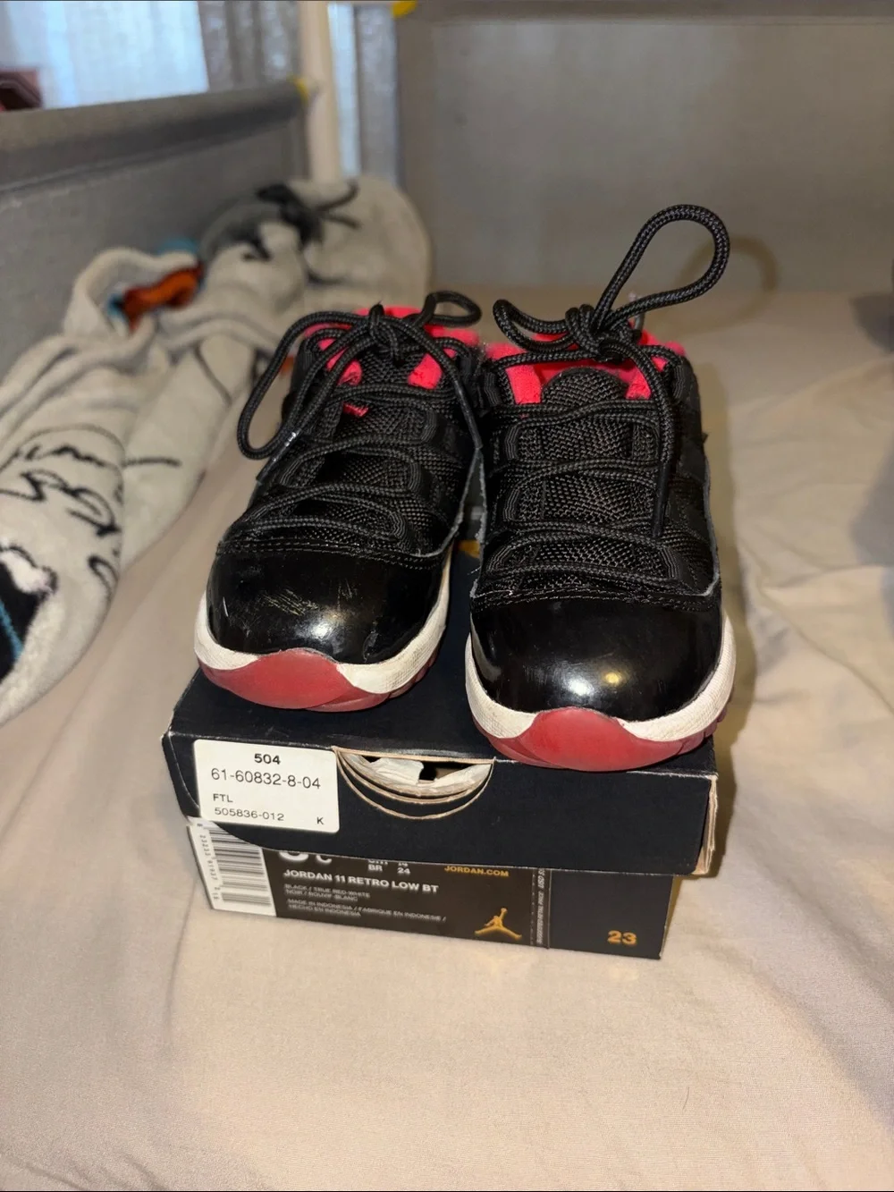 Jordan Kids Black and Red Retro Low Basketball Sneakers